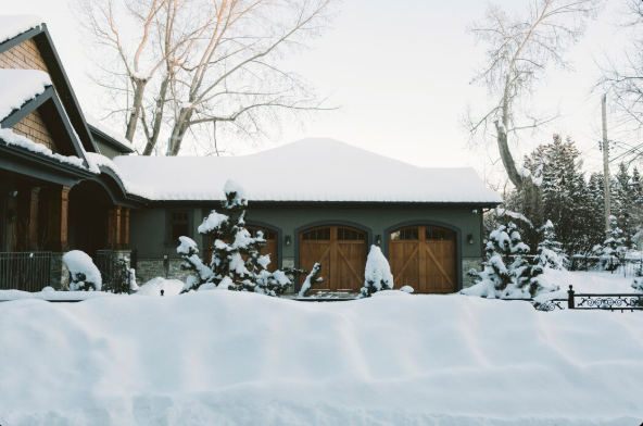 Snow and ice buildup on a residential roof in winter